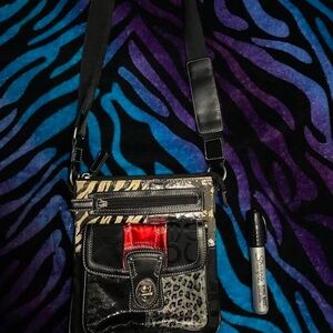 Black and silver animal print crossbody bag